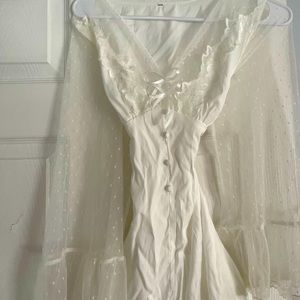 white laced dress with cinched waist